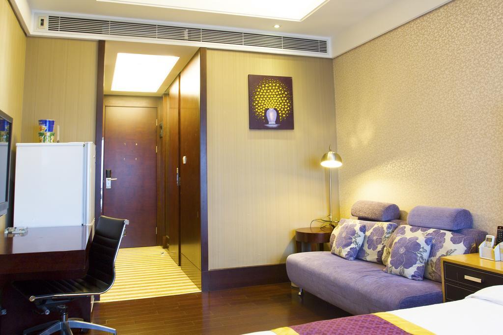 Tamrac International Apartment Canton Chambre photo