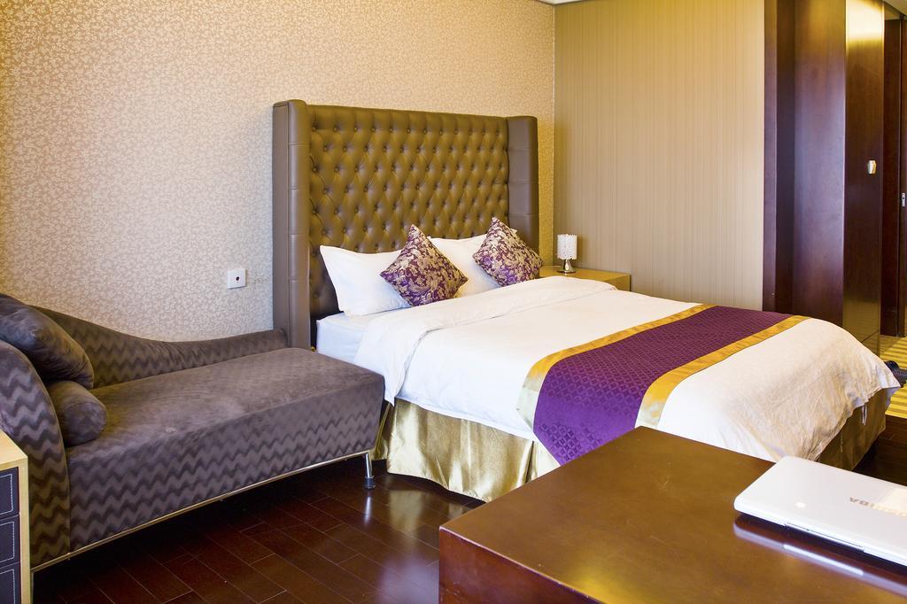 Tamrac International Apartment Canton Chambre photo