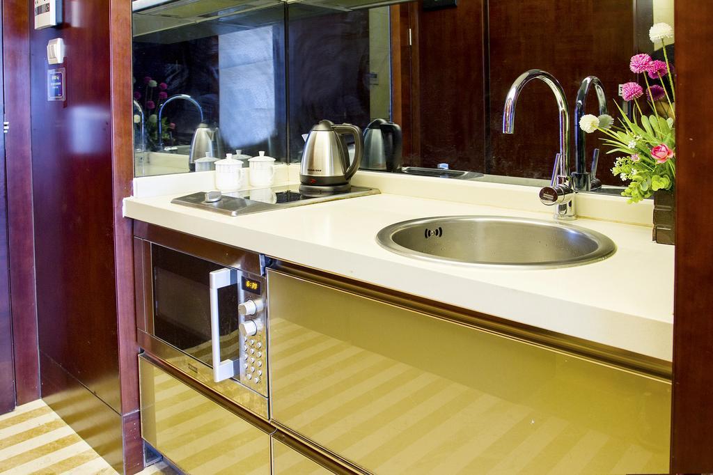 Tamrac International Apartment Canton Chambre photo