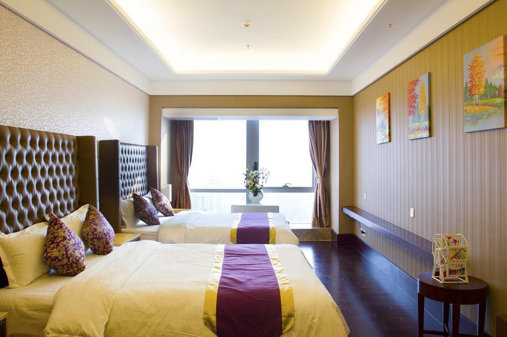 Tamrac International Apartment Canton Chambre photo