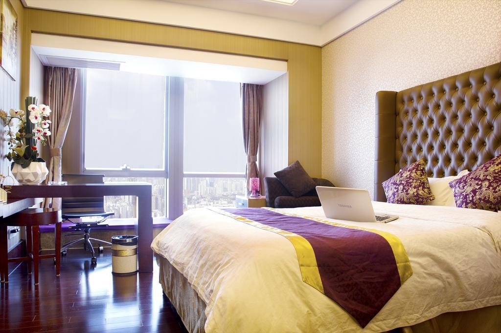 Tamrac International Apartment Canton Chambre photo