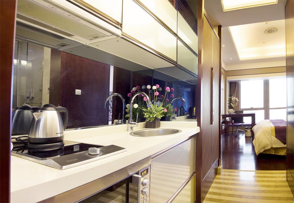 Tamrac International Apartment Canton Chambre photo