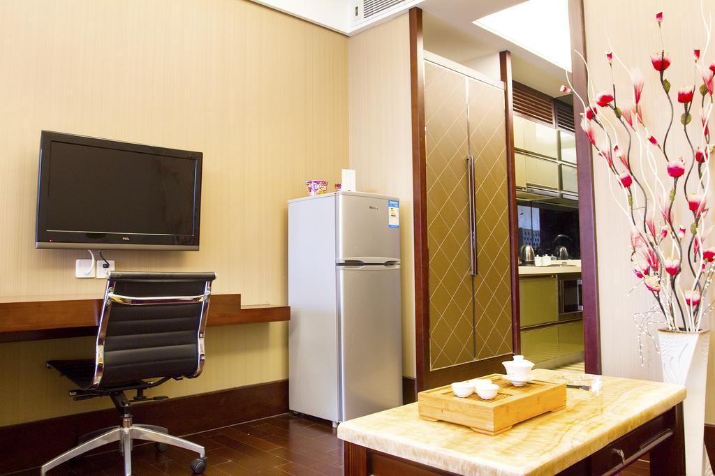 Tamrac International Apartment Canton Chambre photo